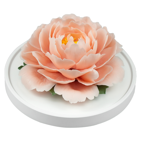 Luxury ceramic flower scent diffuser for home in peach pink, peony, displayed from side
