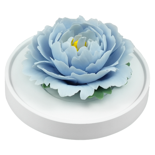 Luxury ceramic flower scent diffuser for home in light blue, peony, displayed from side