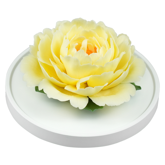 Luxury ceramic flower scent diffuser for home in pale yellow, peony, displayed from side