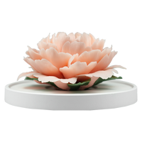 Luxury ceramic flower scent diffuser for home in peach pink, peony, displayed from front