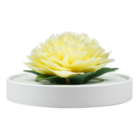 Luxury ceramic flower scent diffuser for home in yellow, carnation, displayed from front