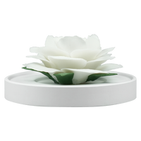 Luxury ceramic flower scent diffuser for home in ivory, camellia, displayed from front
