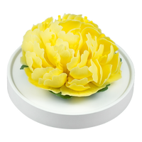 Luxury ceramic flower scent diffuser for home in yellow, mum, displayed from side