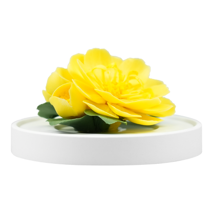 Luxury ceramic flower scent diffuser for home in yellow, ranunculus , displayed from front