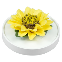 Luxury ceramic flower scent diffuser for home in yellow, sunflower, displayed from side