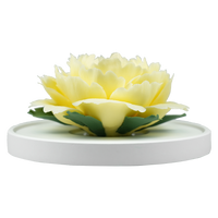 Luxury ceramic flower scent diffuser for home in pale yellow, peony, displayed from front