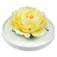 Luxury ceramic flower scent diffuser for home in pale yellow, peony, displayed from side